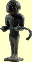 Etruscan statue of an Augur holding a Lituus from the votive hoard of Lapis Niger, Rome. ca. 550 B.C.